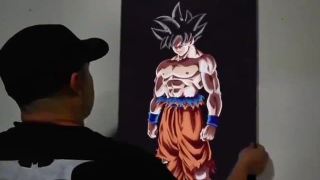 Une affiche de Goku s'anime grâce à la vidéoprojection - KULTT